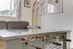 Foosball table offers entertainment for it`s guests
